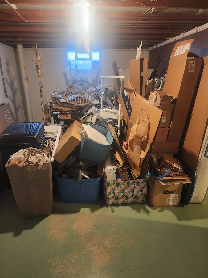 Roll-off dumpster container at job site for Concrete Dumpster Rental in Nibley